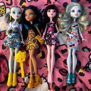 Set of Four Monster High Dolls with Colorful Dresses